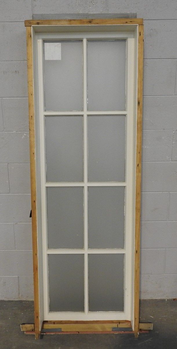 colonial style wooden fixed portrait window with obscure glass