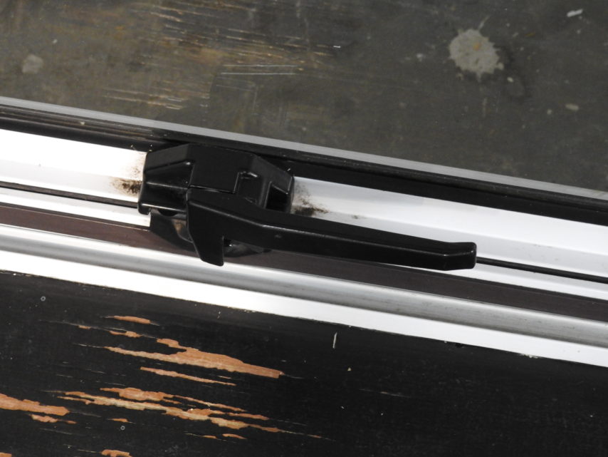 White Aluminium awning landscape window in timber frame