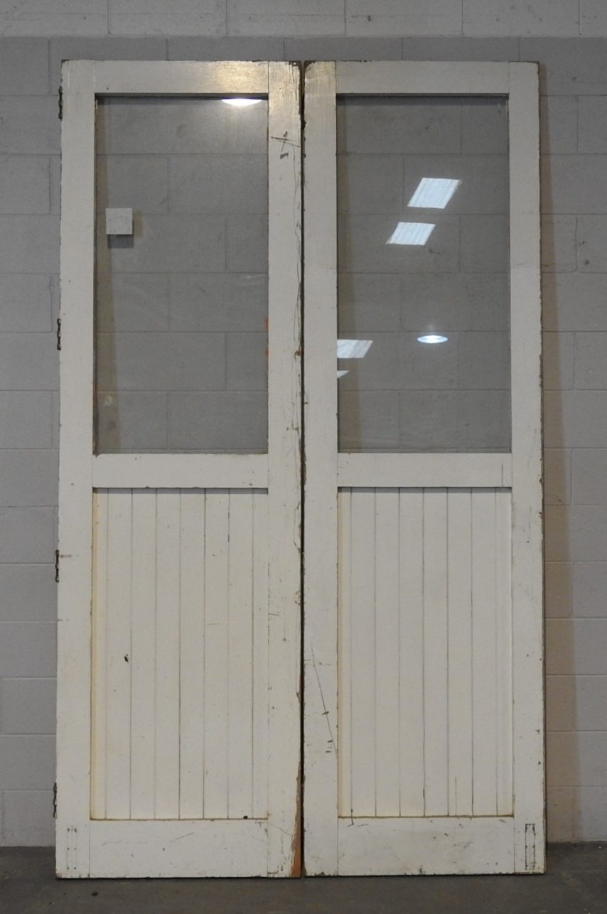 pair of very tall Wooden exterior bifold tg&v doors with glass