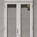 very tall Wooden French Doors with awning window toplight