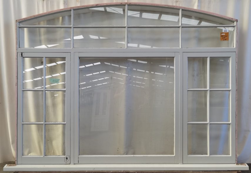 Wooden arched twin awning window