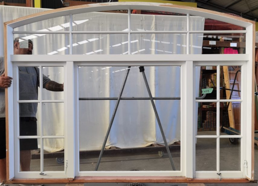 Wooden arched twin awning window