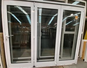 Appliance white aluminium double glazed three leaf bi-fold door