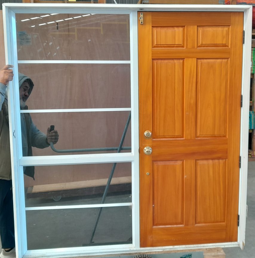 white aluminium framed wooden entrance door with sidelight