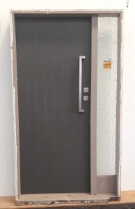 Wooden entrance door with sidelight