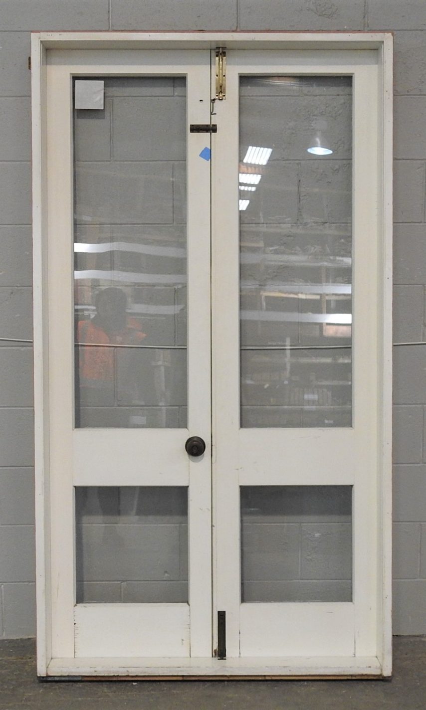 Wooden French Doors Hung in Frame