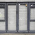 Denim Blue Aluminium Bi-Fold Door With Awning Windows