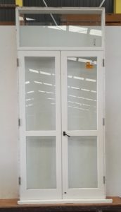 Wooden French door with toplight