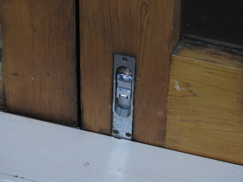 Wooden (Cedar) French Doors With Toplight Hung in Frame