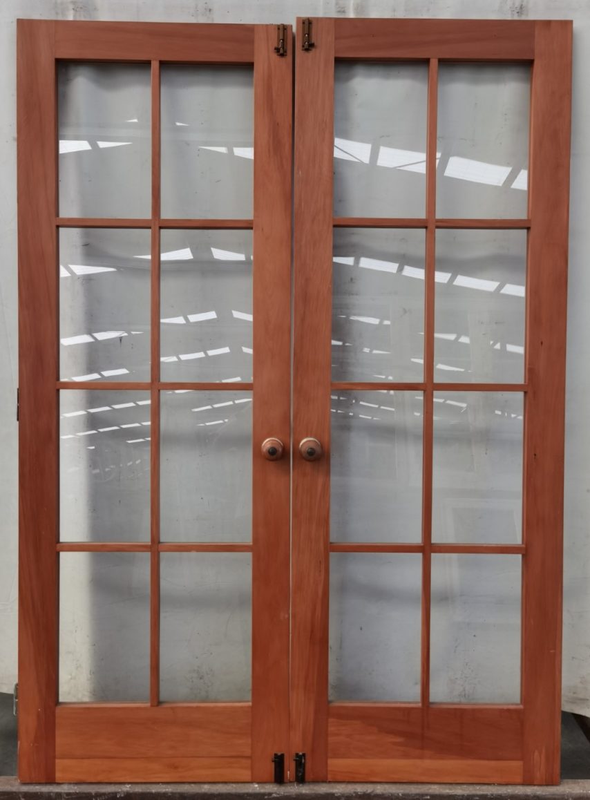 Wooden un-hung rimu interior French doors