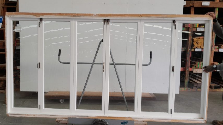 Wooden bi-fold window