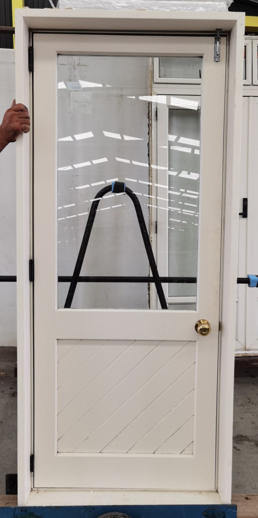 Off white aluminium framed timber door