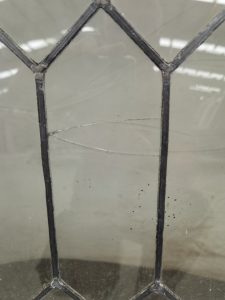 wooden fixed twin leadlight window
