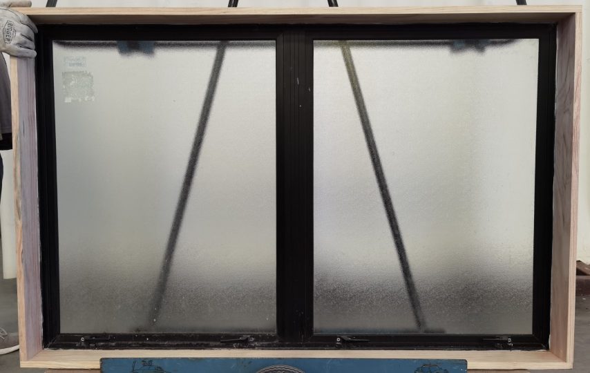 Black aluminium twin awning window