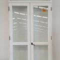 Wooden French door with toplight