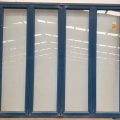 Blue aluminium bi-fold door