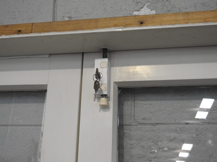 Wooden French Doors Hung In Frame