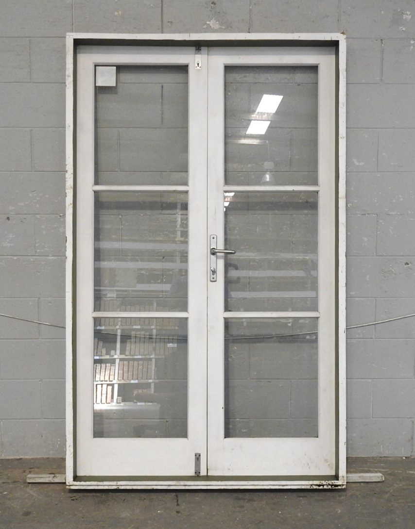 Wooden French 3-Light Doors Hung In Frame