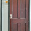 Karaka green aluminium frame and Cedar door