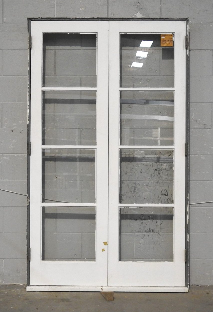 Wooden French Doors Hung in Frame