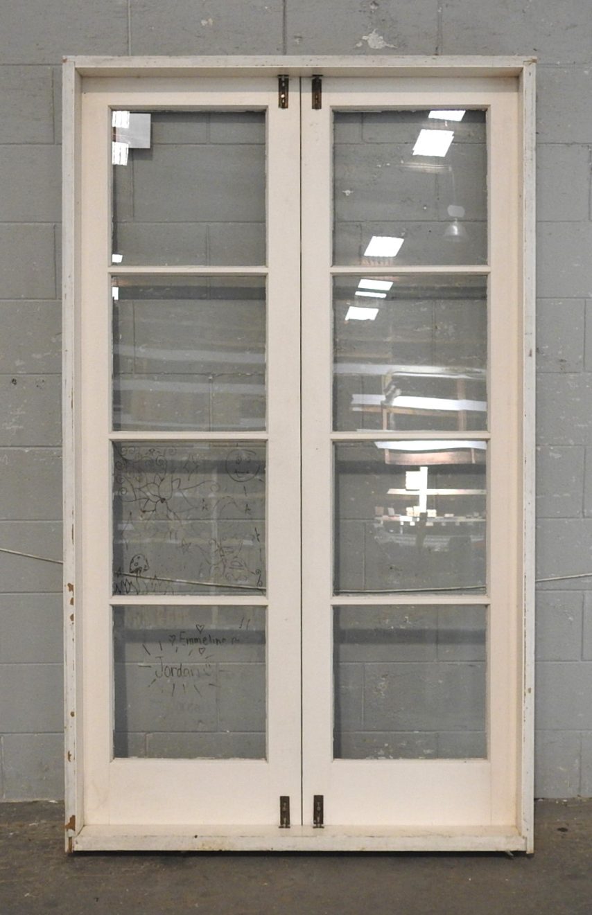 Wooden French Doors Hung in Frame