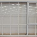 Colonial style white aluminium awning window