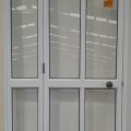 White aluminium door with side light