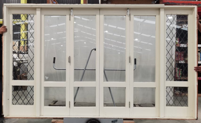 Wooden four leaf bi-fold door