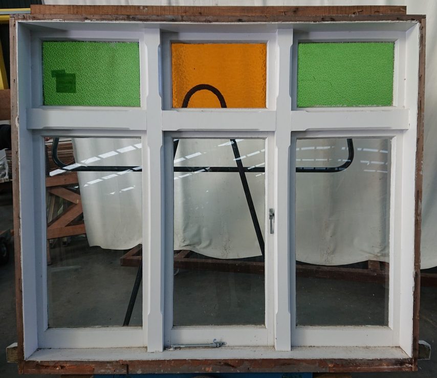 Bungalow Wooden casement window with coloured glass toplight