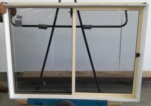 Cream aluminium sliding window