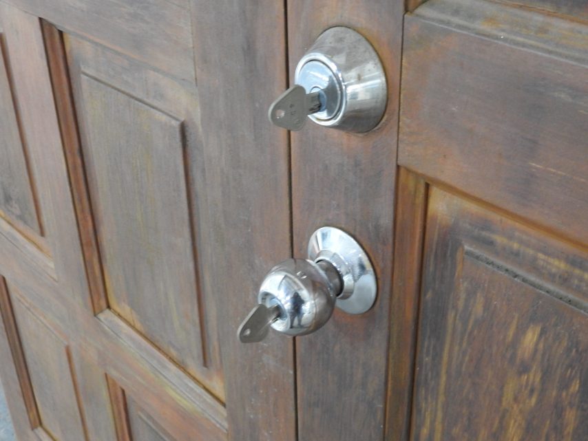 Pair of Wooden Exterior 8-Panel Double Entry Doors - Unhung