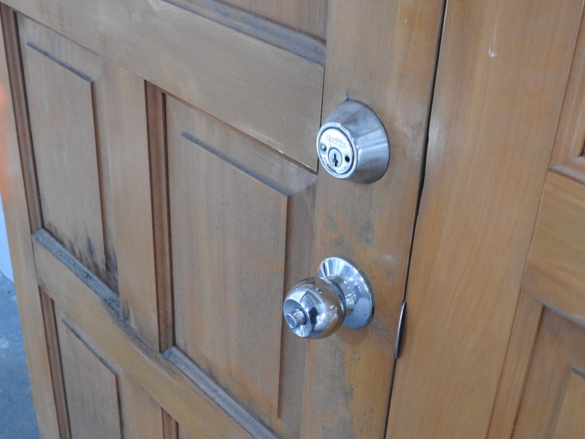 Pair of Wooden Exterior 8-Panel Double Entry Doors - Unhung