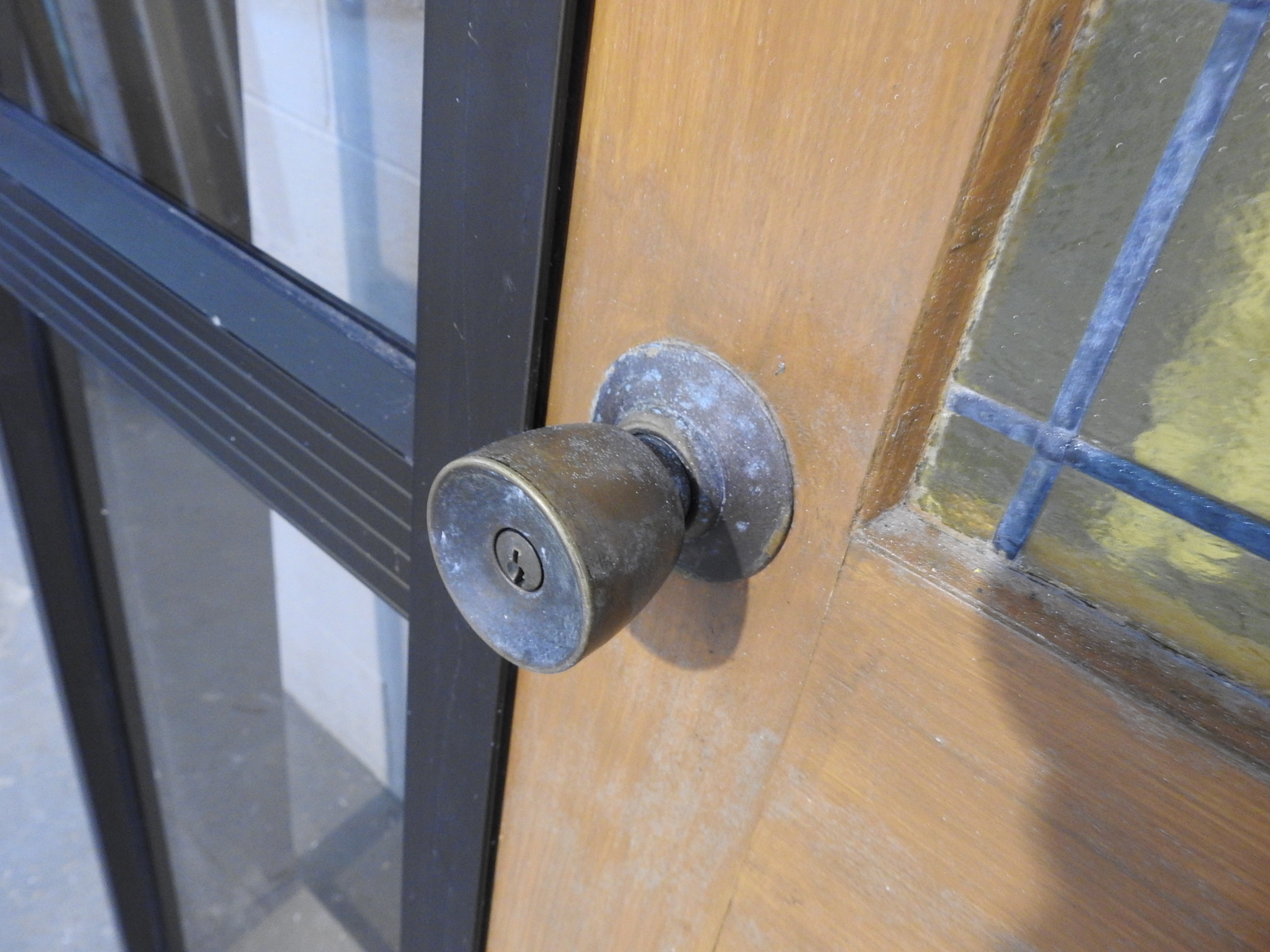 Bronze Ali' Frame with Wooden 4 Panel Entrance Door