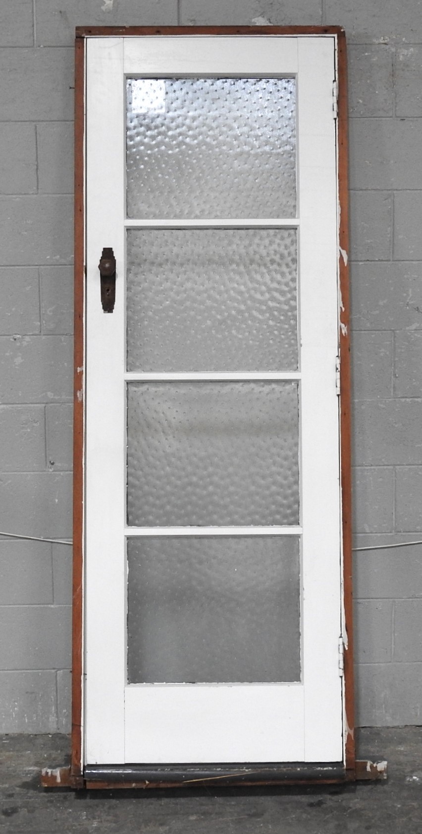 Narrow Wooden Exterior Entry Door Hung In Frame