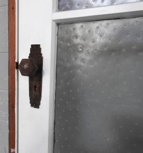 Narrow Wooden Exterior Entry Door Hung In Frame