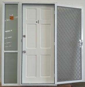 White aluminium entrance door with security door