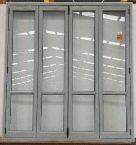 Mint green aluminium four pane bi-fold door