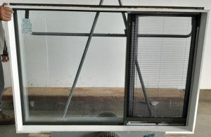 Karaka Green double glazed aluminium awning window