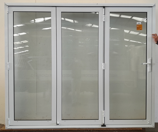 White double glazed bi-fold with dedicated door