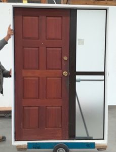 Brown aluminium frame with timber door and sidelight