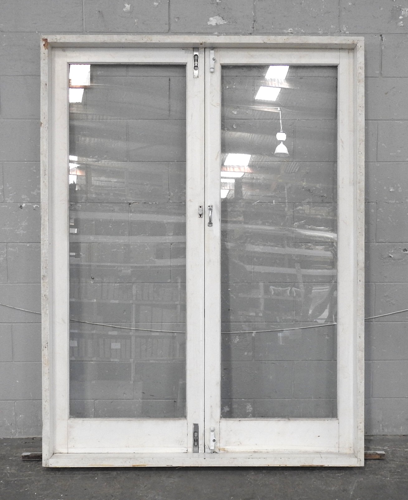 Wooden French Doors Hung in Frame