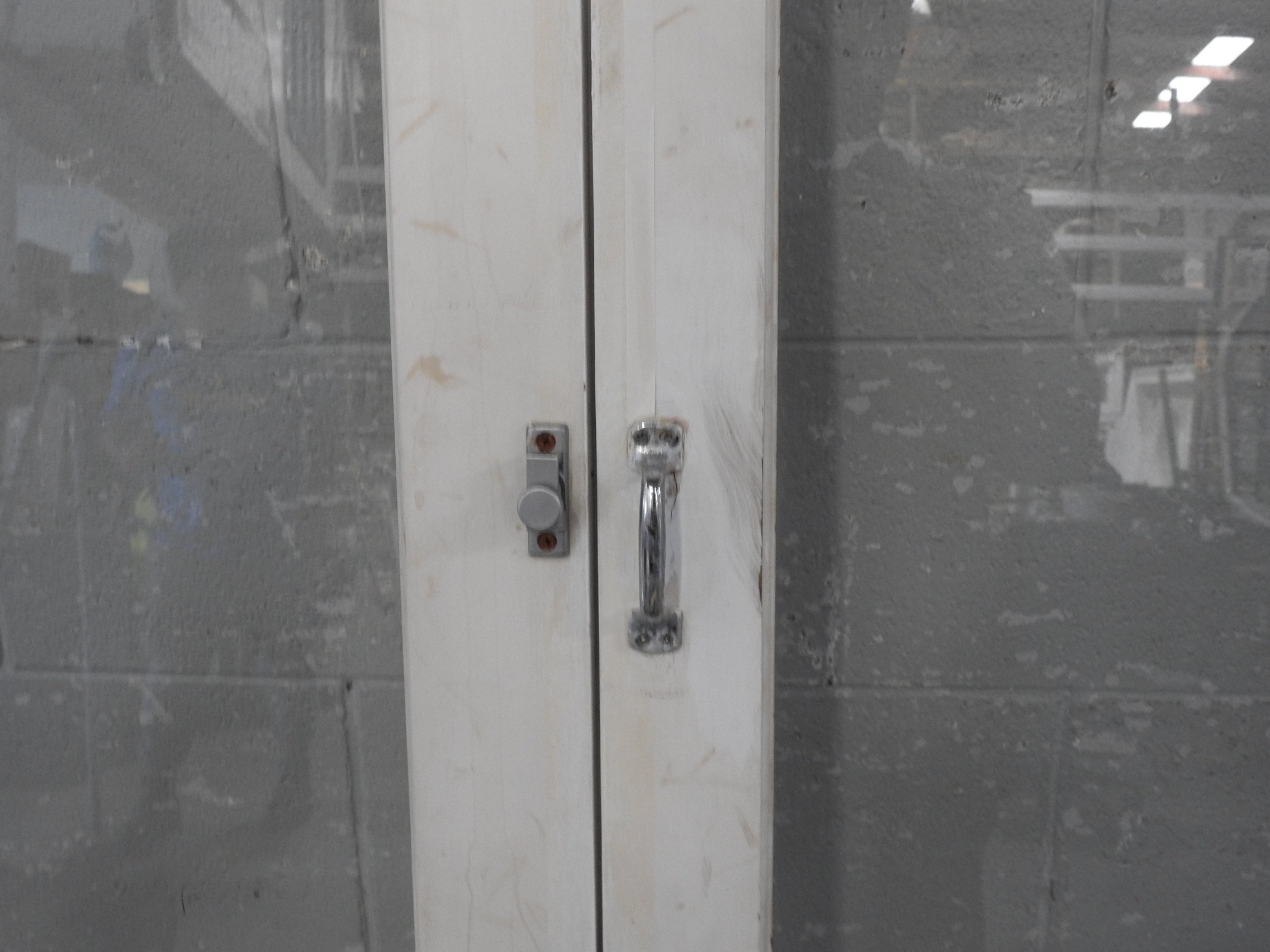 Wooden French Doors Hung in Frame