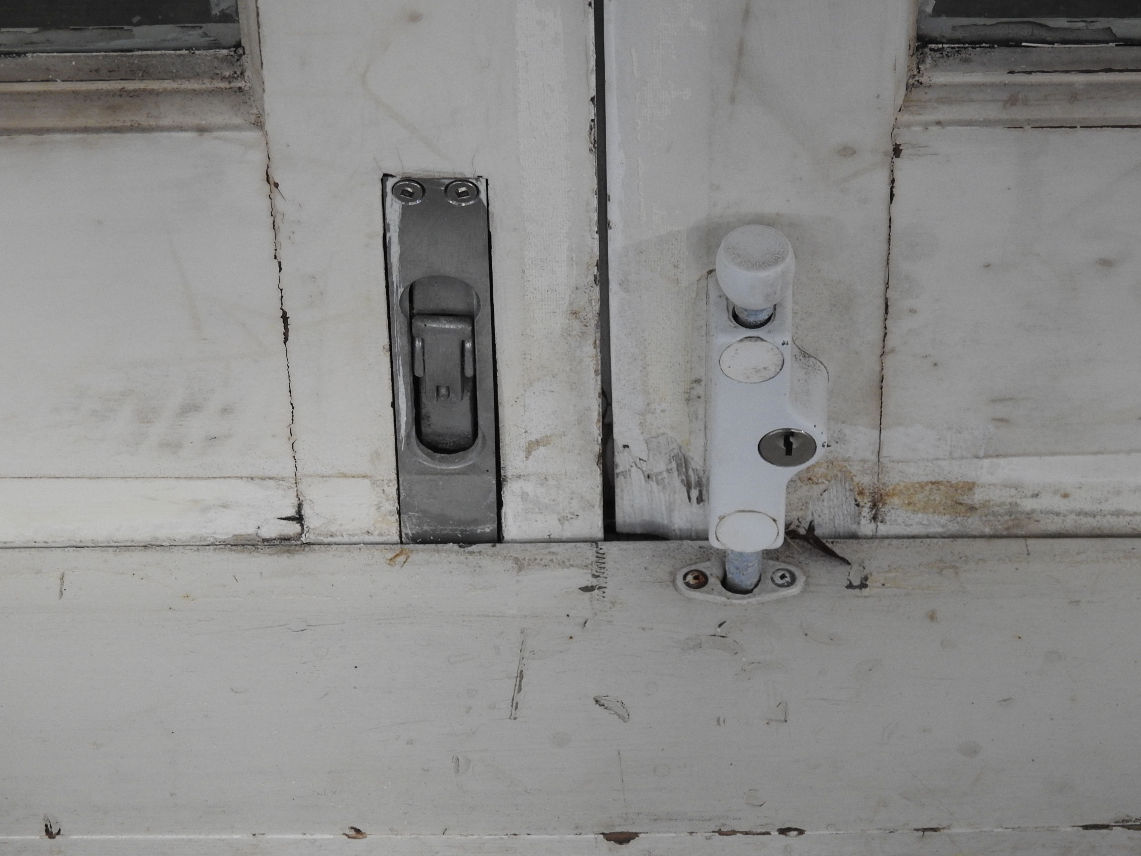 Wooden French Doors Hung in Frame