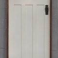 Wooden Bungalow 3-Panel Door Hung In Frame