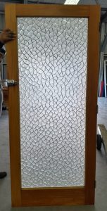 Wooden rimu with vintage glass entrance door