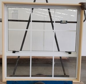 Colonial style white aluminium awning window