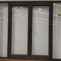 Brown aluminium French doors with sidelight