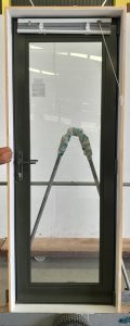 Karaka green double glazed aluminium door