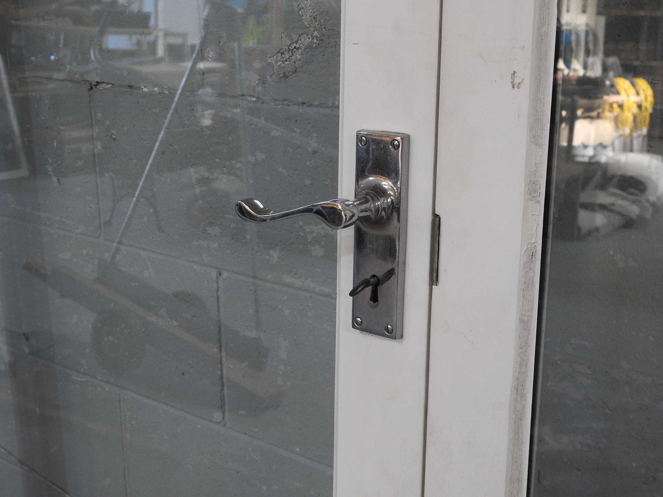 Wooden French Doors Hung In Frame