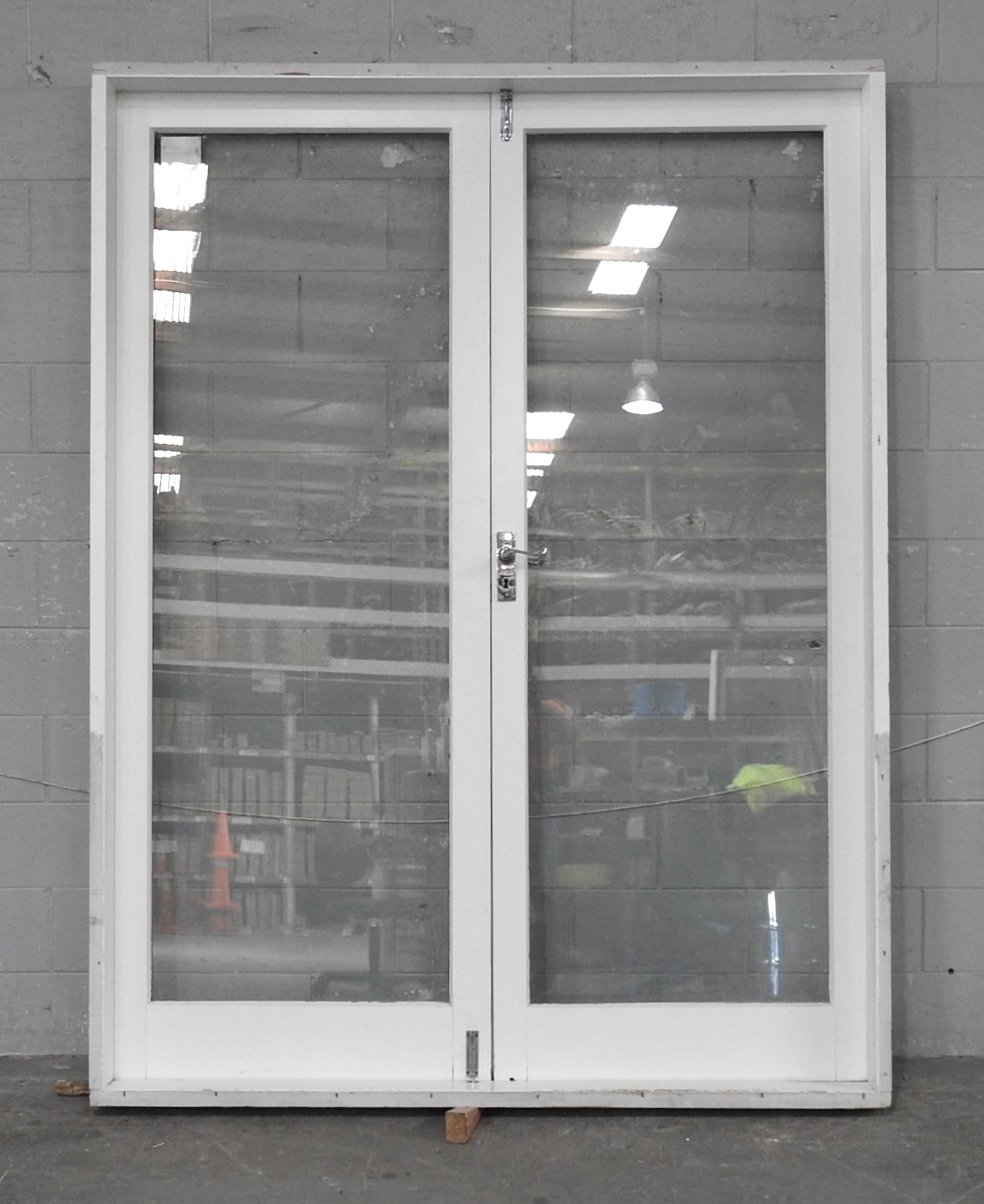 Wooden French Doors Hung In Frame